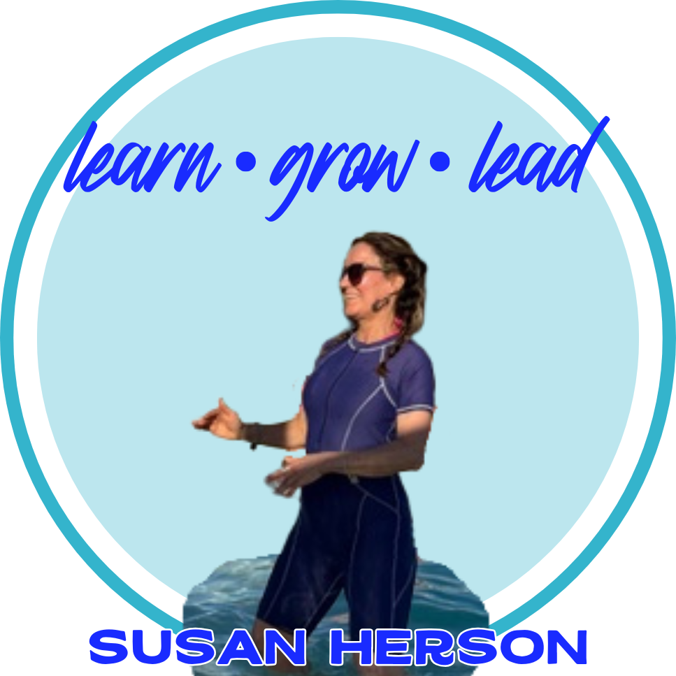 Susan, a lady with braided brown hair and fair skin, leads an Aqua Splash class.